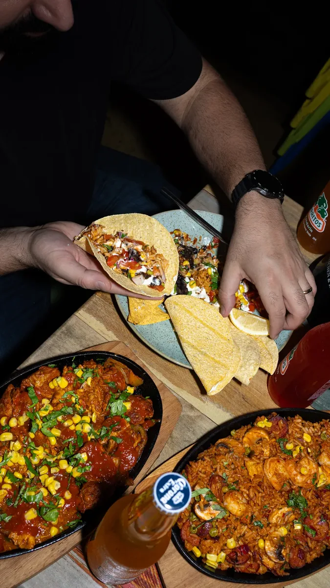 Friends feasting together at El Mexicano